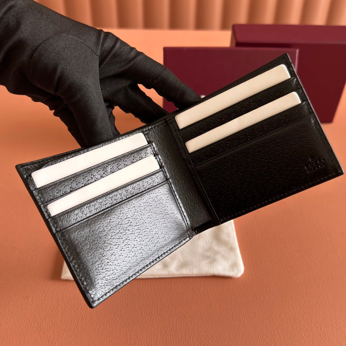 GG Marmont Bi-Fold Wallet Black Pebbled Leather GHW