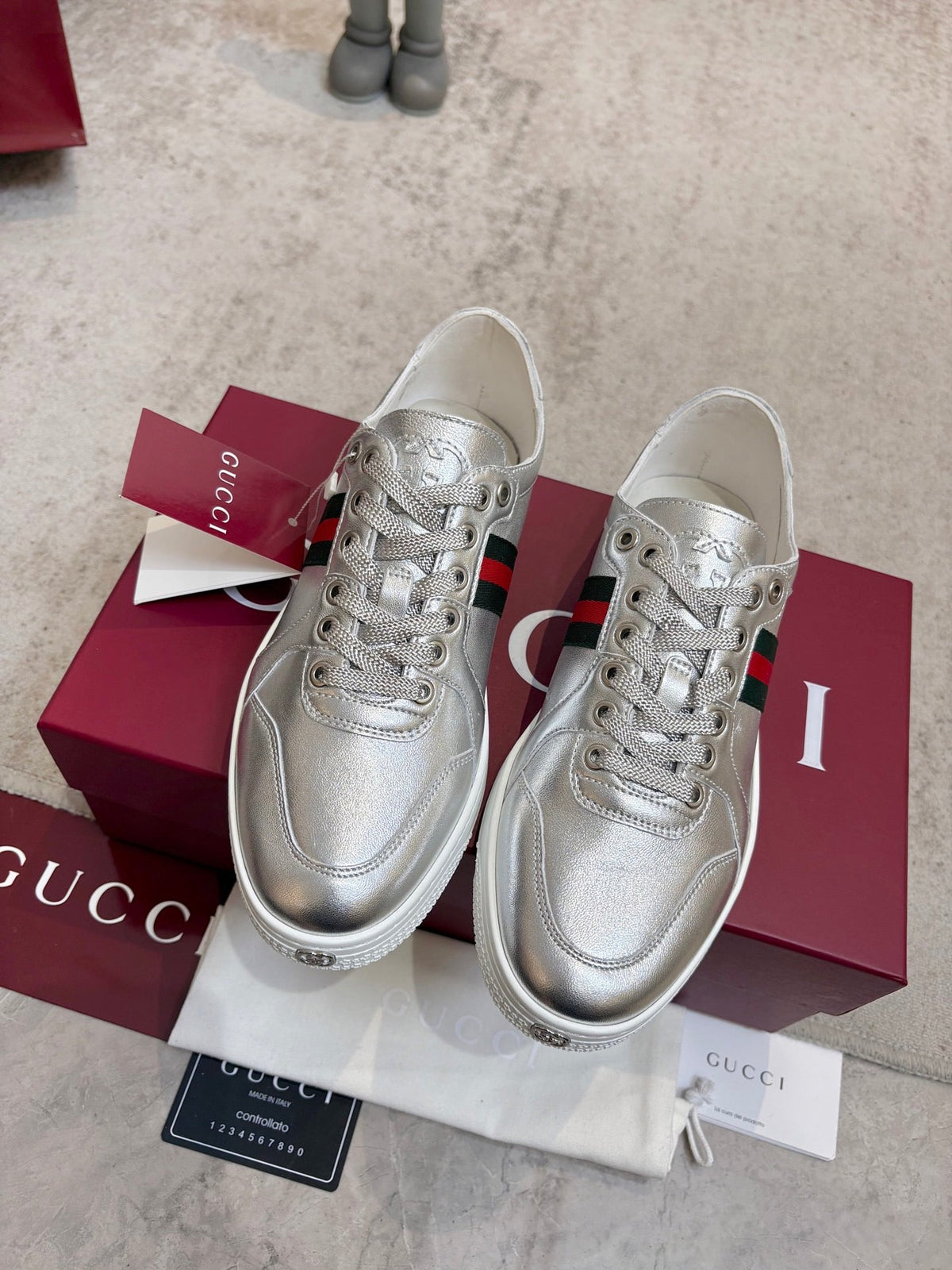 GG Stretch Low-Top Trainers Metallic Silver Leather 824432