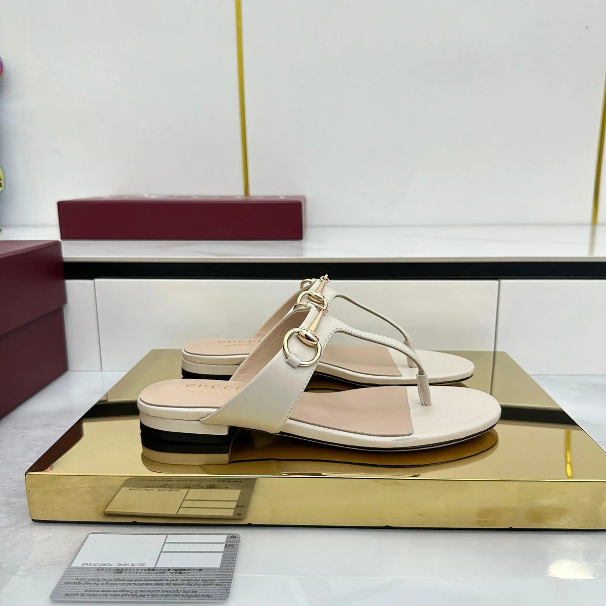 THONG SANDALS IN CREAM WHITE LAMBSKIN WITH GOLD HARDWARE